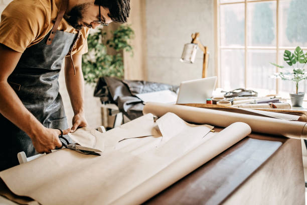 istock Tailor preparing shape for his new product 1173779720