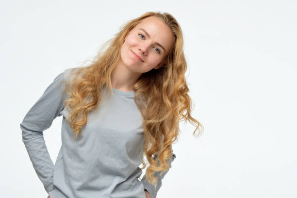 istock Young beautiful happy woman looking at camera with smile. 1173780992