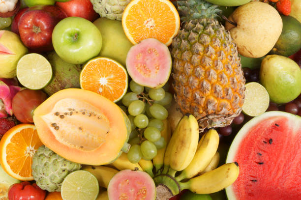 istock Tropical fruits background 1173783090