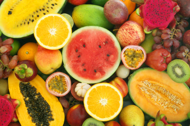 istock Assortment of tropical fruits as background 1173784604