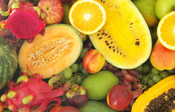 istock Assortment of tropical fruits as background 1173784681