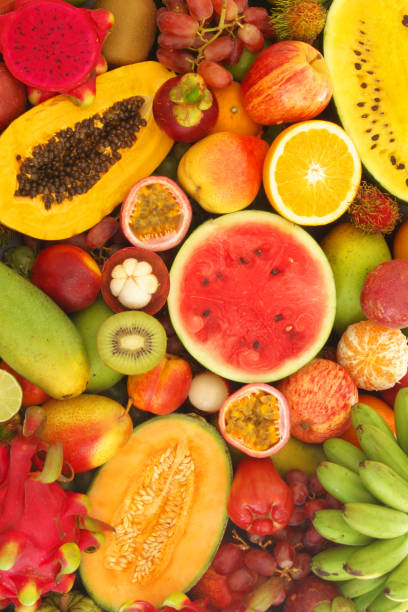 istock Assortment of tropical fruits as background 1173785143