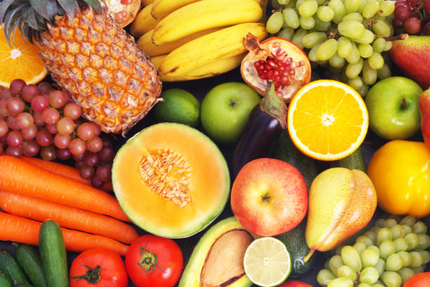 istock Many fruits and vegetables as background 1173786255