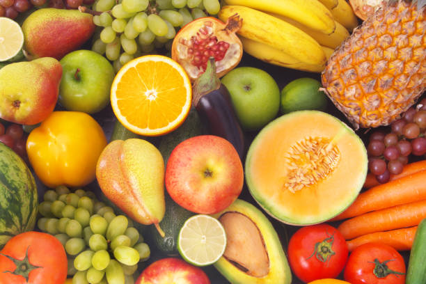 istock Many fruits and vegetables as background 1173786338