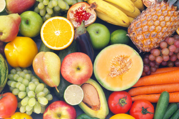 istock Many fruits and vegetables as background 1173786348