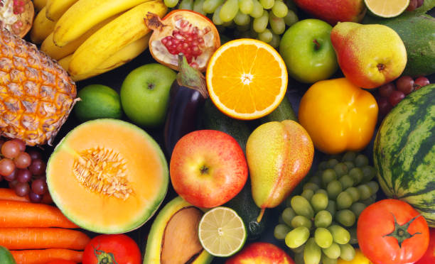 istock Many fruits and vegetables as background 1173786358
