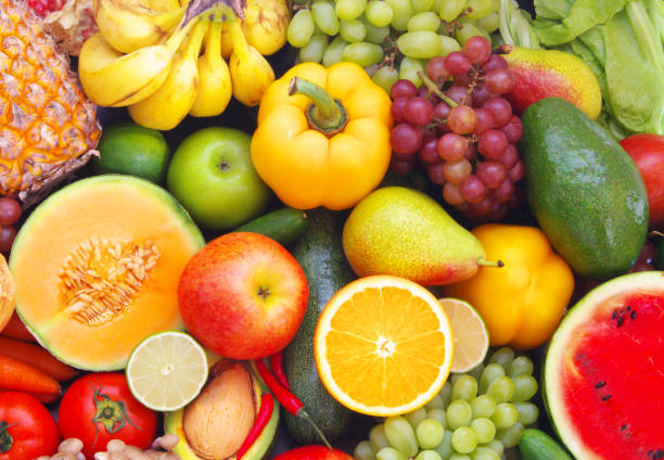 istock Many fruits and vegetables as background 1173786511