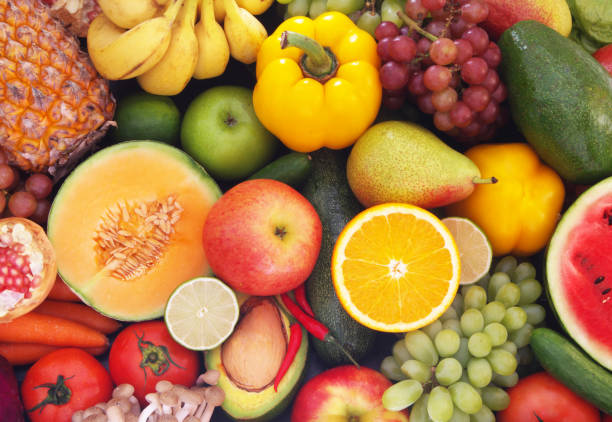 istock Many fruits and vegetables as background 1173786588