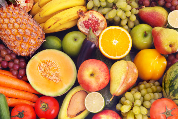 istock Many fruits and vegetables as background 1173786682