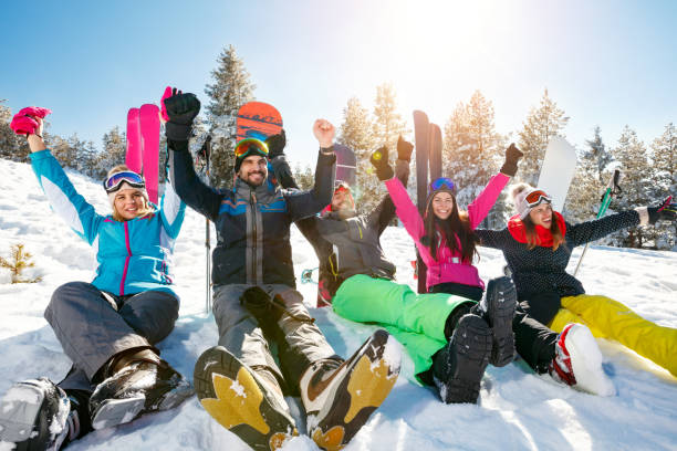 istock friends having fun on ski holiday in mountains 1173787297