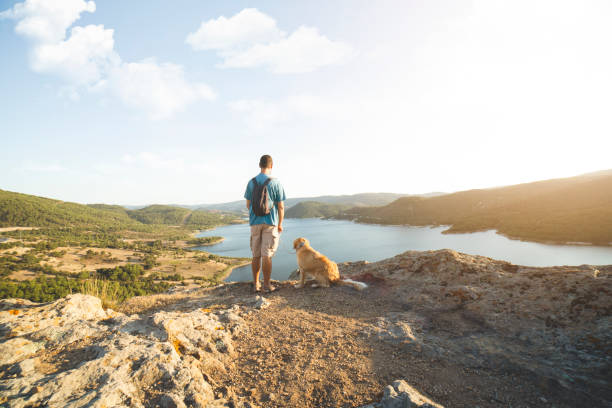 istock Trekking with the dog on mountains 1173788939