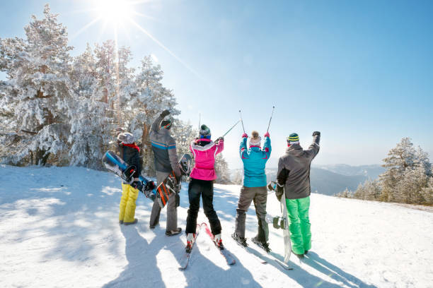 istock friends having fun on ski holiday in mountains 1173789149