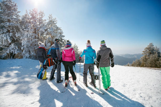 istock friends having fun on ski holiday in mountains 1173789280