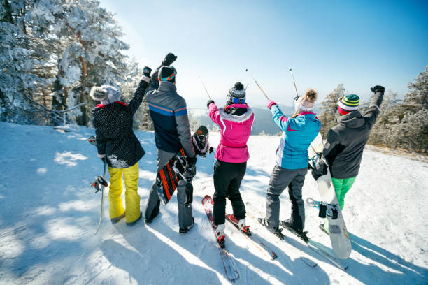 istock friends having fun on ski holiday in mountains 1173789408