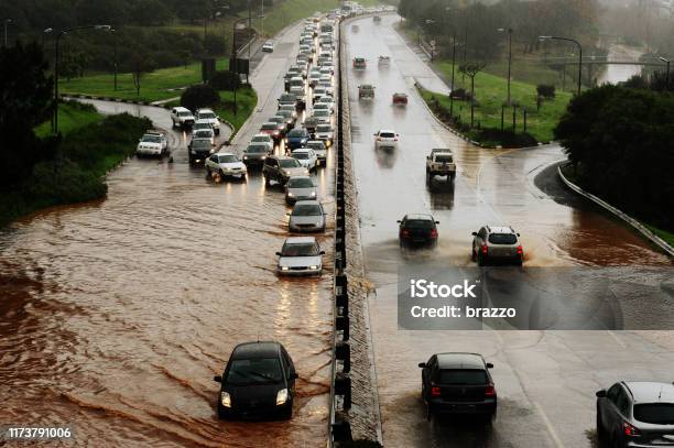 Flooding Road Stock Photo - Download Image Now - Flood, Climate Change, Road