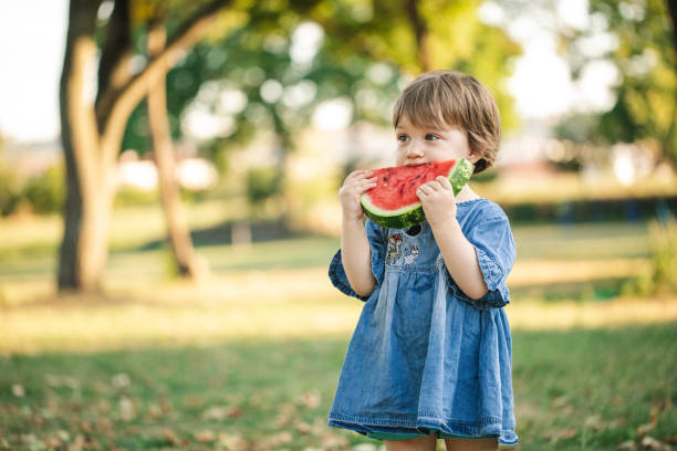 istock Slice of sweet watermelon makes her happy 1173791076