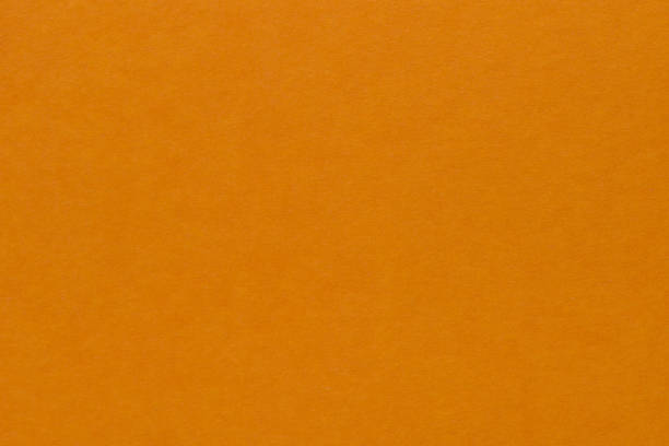 istock yellow or orange paper texture background 1173792602