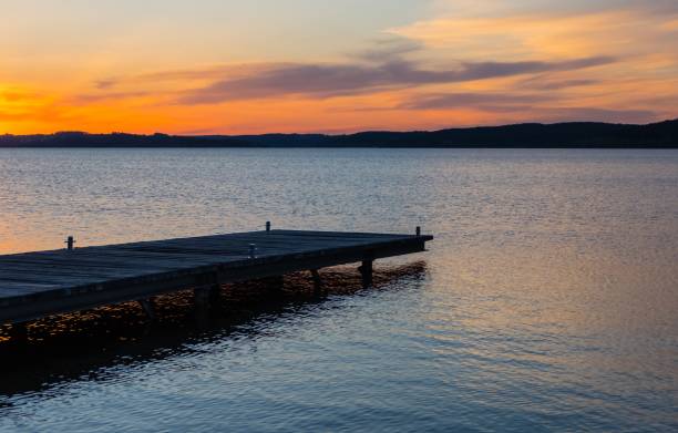 istock Wooden Bridge and Sunset on Lake 1173797203