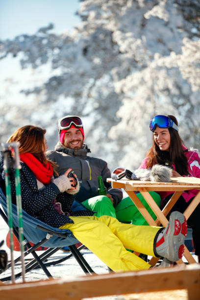 istock friends having fun on ski holiday in mountains 1173798747