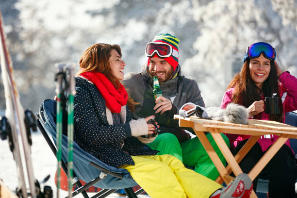 istock friends having fun on ski holiday in mountains 1173798895