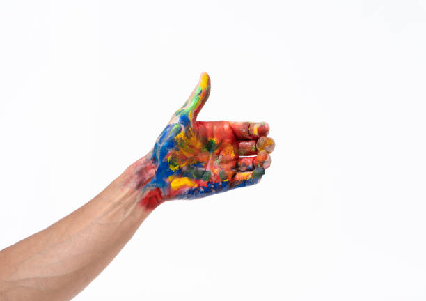 istock Man hand in colorful on white background 1173799005