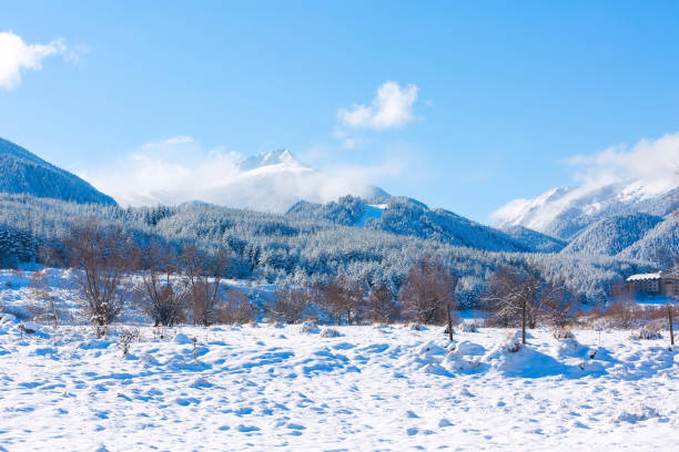 istock travel ski background with slopes, snow mountain peak, copyspace 1173799215
