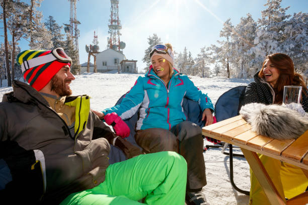 istock friends having fun on ski holiday in mountains 1173799754