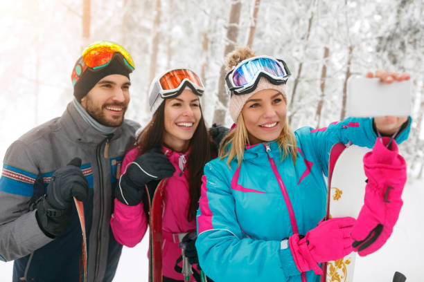 istock friends having fun on ski holiday in mountains 1173801948