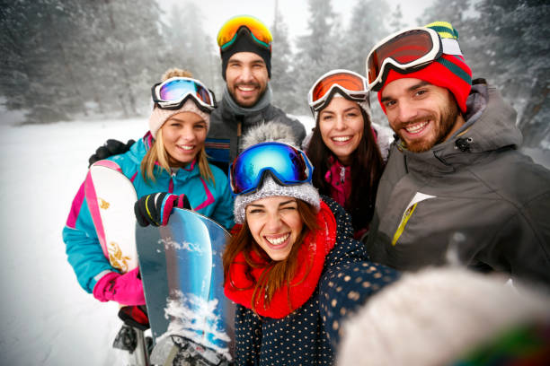 istock friends having fun on ski holiday in mountains 1173802237