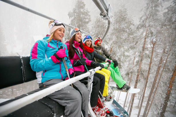 istock friends having fun on ski holiday in mountains 1173803432