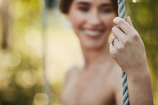 Closeup shot of a woman's ring on her wedding day