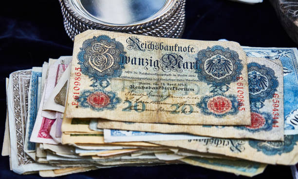 istock Stack of historical banknotes withGerman banknote from the year 1910, no longer valid, with a value of 20 Reichsmark on top 1173809819