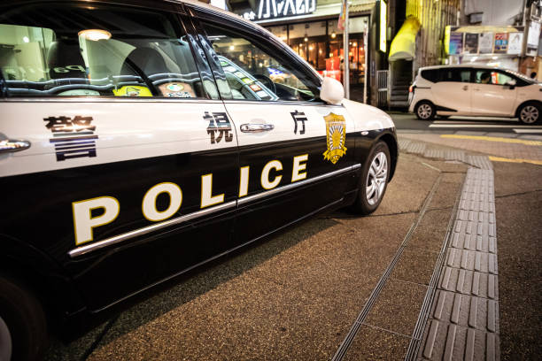 japan police - car driving transportation tokyo prefecture stock-fotos und bilder
