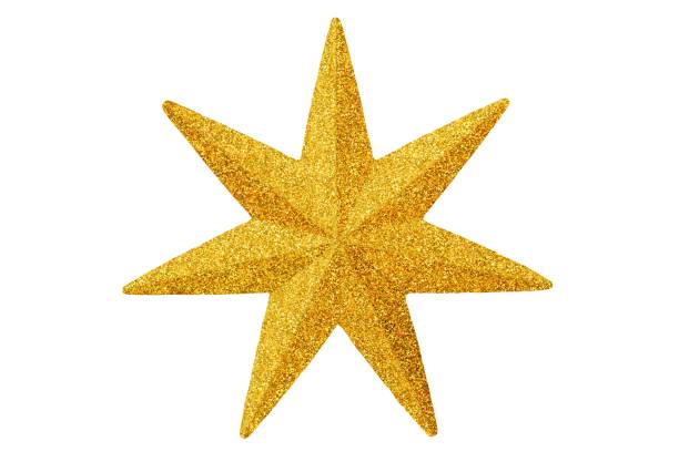 Macro of gold Christmas star isolated on white background