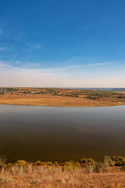 istock Beautiful autumn landscape with a river 1173813339