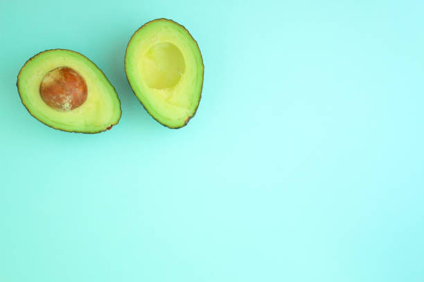 istock avocado (green and ripe fruit, vitamins) top menu concept. food background. copy space 1173814470
