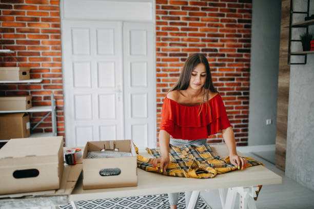 istock Young woman fulfilling online order 1173817590