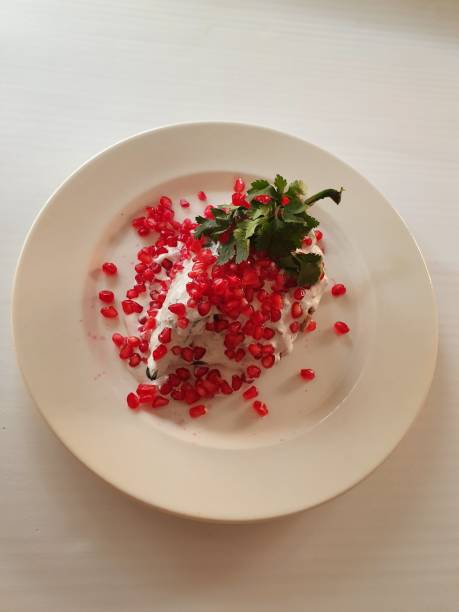 istock plate of poblano pepper bathed in nogada sauce 1173817836