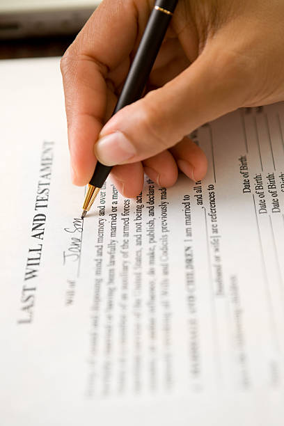 istock Woman signing will - vertical 117381800