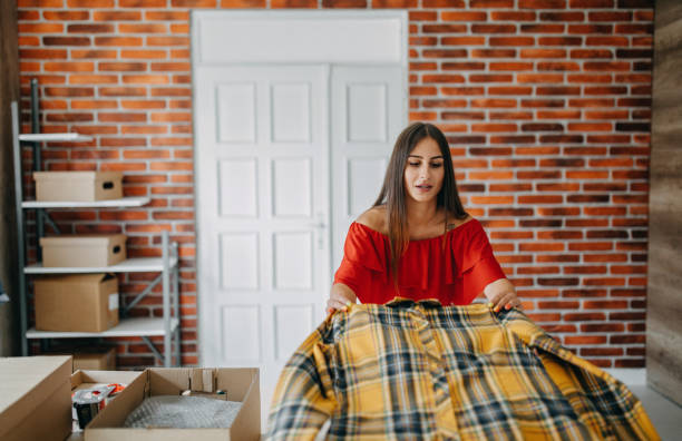 istock Young woman fulfilling online order 1173819526
