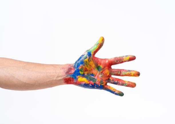 istock Man hand in colorful on white background 1173819554