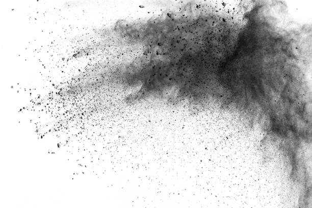 istock Black particles splatter on white background. Black dust splash on white background. 1173823997