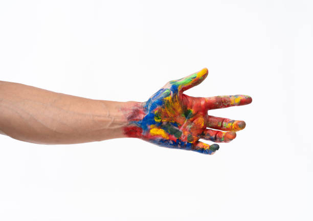 istock Man hand in colorful on white background 1173824222