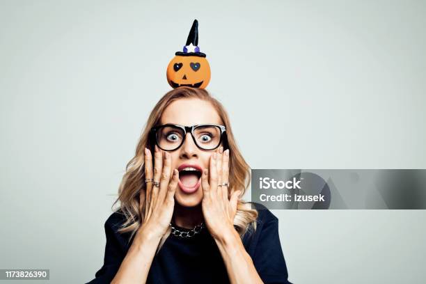 Shocked Woman Ready For Halloween Stock Photo Stock Photo - Download Image Now - Pumpkin, Autumn, Eyeglasses