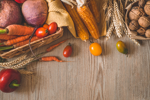 Harvest, Autumn. Still life with Thanksgiving concept. Panoramic collection of fresh healthy fruits and vegetables. Healthy eating background. Vegetables on vintage rustic wooden background.