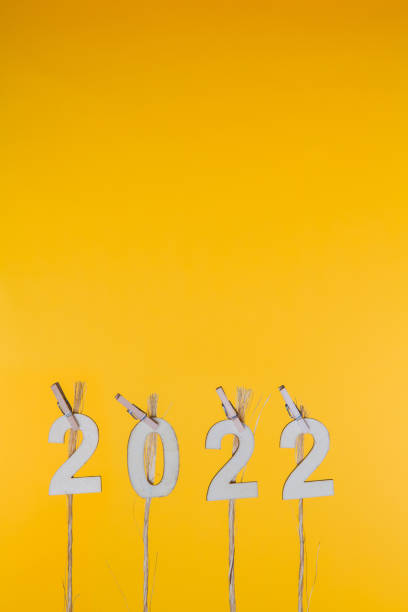 istock New Year 2022 Concepts Clipped Cards on yellow background 1173830471