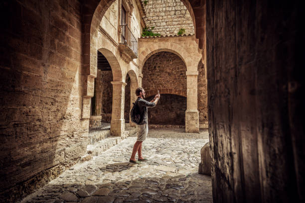 traveler exploring the city man exploring the old town old town photos stock pictures, royalty-free photos & images
