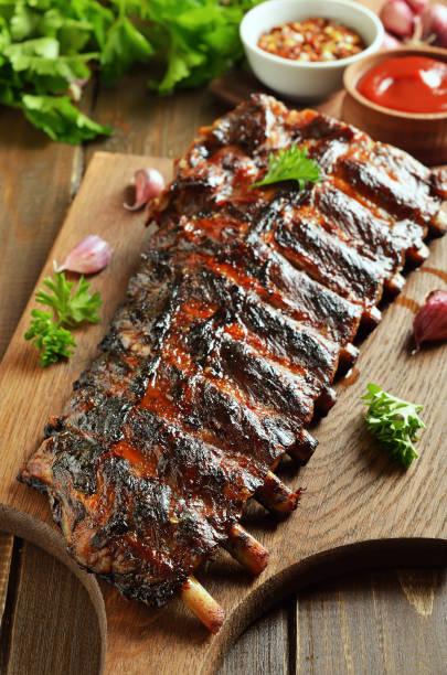 istock Spicy hot grilled spare ribs on cutting board 1173835936