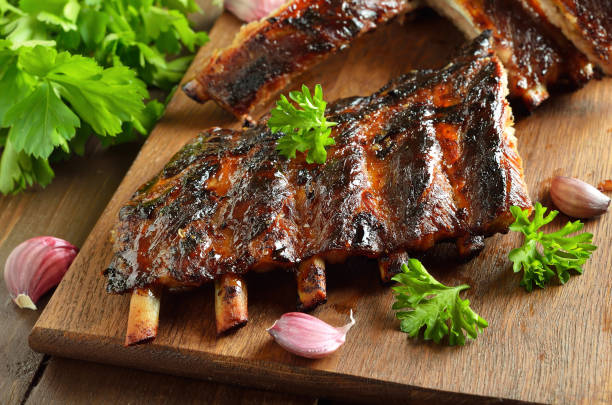 istock Spicy hot grilled spare ribs on cutting board 1173836461