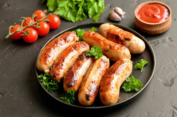 istock Barbecue sausage with fresh parsley 1173840055